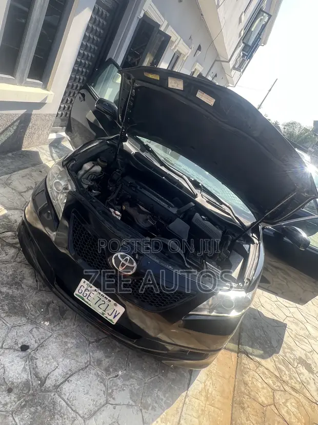 2009 Toyota Camry XLE Sedan - Baƙi - 1