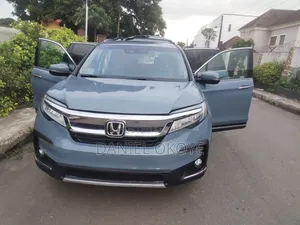 2022 Honda Pilot Touring SUV Mai Zama 7 - Launi Teal