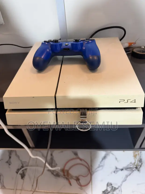 Used PS4 Console with 5 Games and One Controller - 1