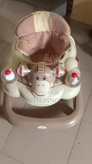 Neatly Used Baby Walker with Musical Toys