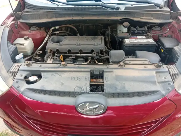 Hyundai Tucson 2013 Red SUV - 1