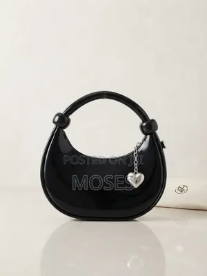 Trendy Patent Half-Moon Handbag with Heart Charm