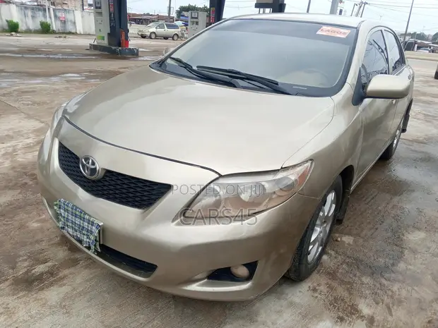 Toyota Corolla 2009 Gold - 1