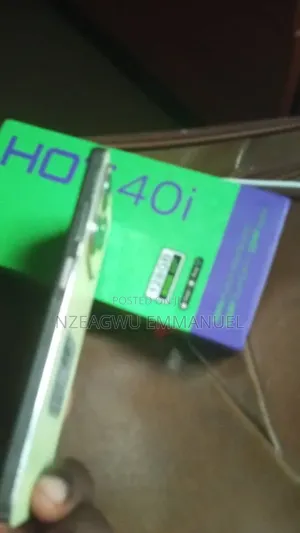 Infinix Hot 40i 128GB Yellow (Am yi amfani da shi, Fuska ta karye)