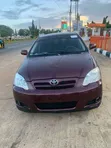 Toyota Corolla 2006 Maroon - 1