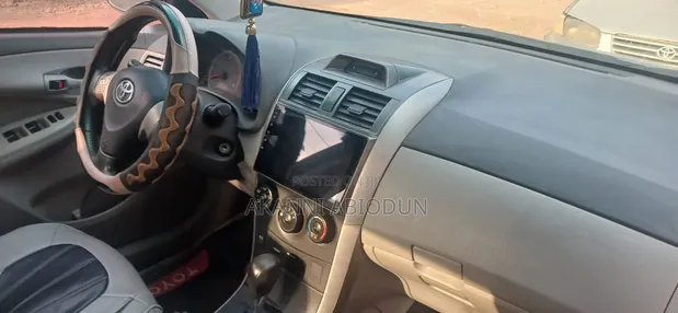 2010 Toyota Corolla LE - An Inganta zuwa 2013 - 1