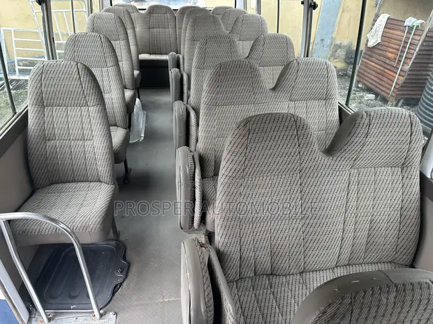 Toyota Coaster 2010 White - 1