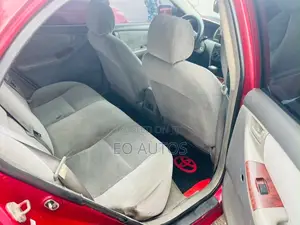 2004 Toyota Corolla - Red, Registered