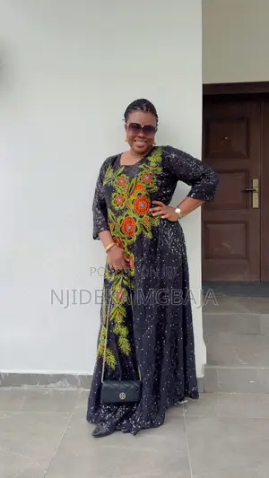 Elegant Black Lace & Ankara Maxi Gown with Floral Embroidery