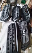 Complete Front Bumper & Grill for Toyota Camry/Tacoma - 2