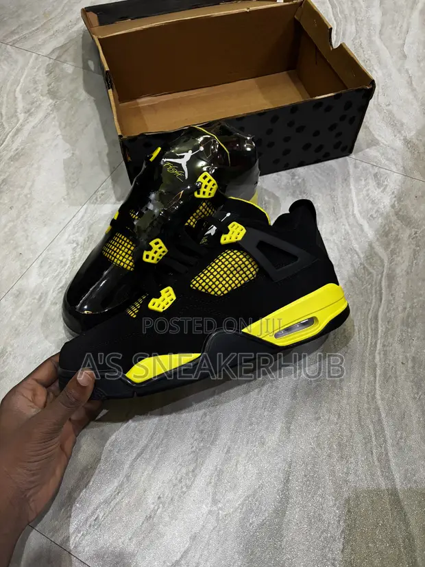 Air Jordan 4 Retro "Thunder" Sneakers (Replica) - 1