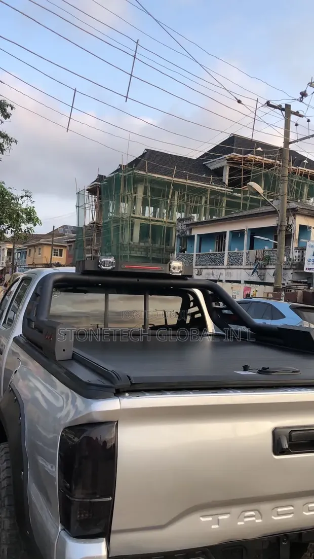 Toyota Tacoma/Hilux/Ford Ranger Iron Spoiler & Booth Cover - 1