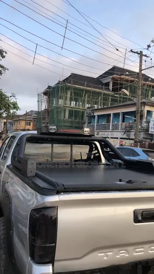 Toyota Tacoma/Hilux/Ford Ranger Iron Spoiler & Booth Cover