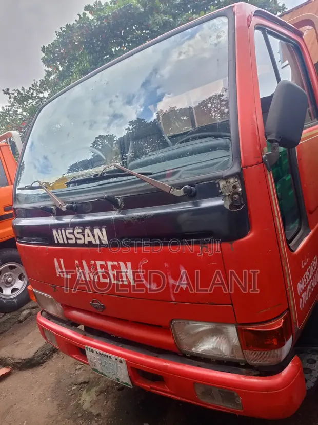 Nissan Cabstar 1999 Red Mini Truck - 1