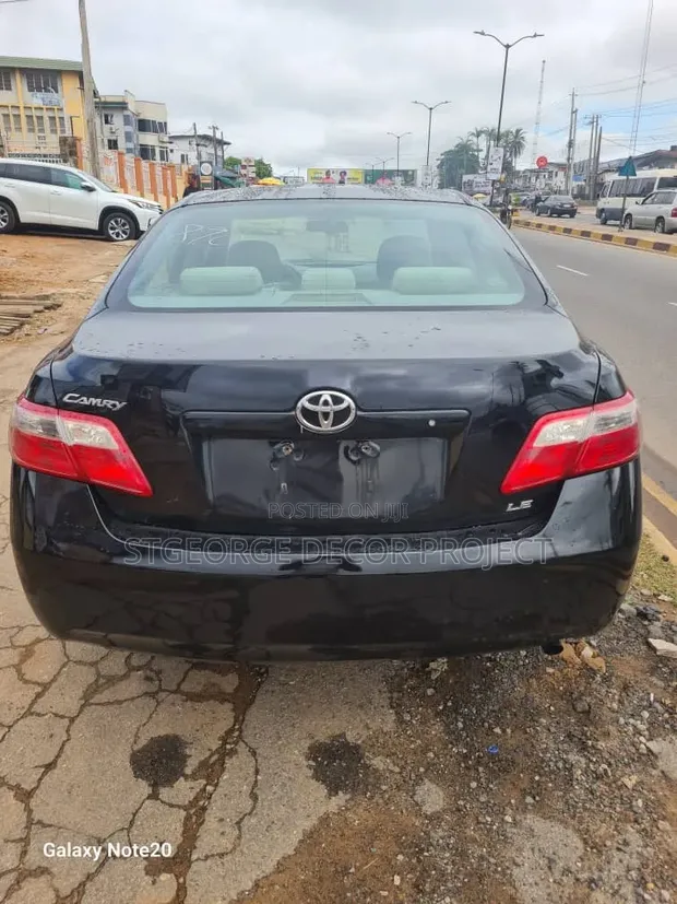 2009 Toyota Camry Base 2.4L Sedan - Baƙi - 1