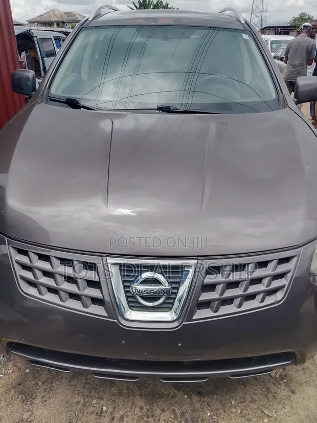 Nissan Rogue S 2013 Brown - 1