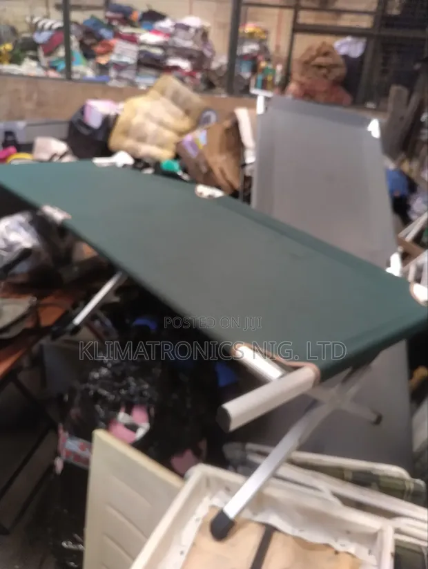 Neat Foreign Used Camp Bed - 1