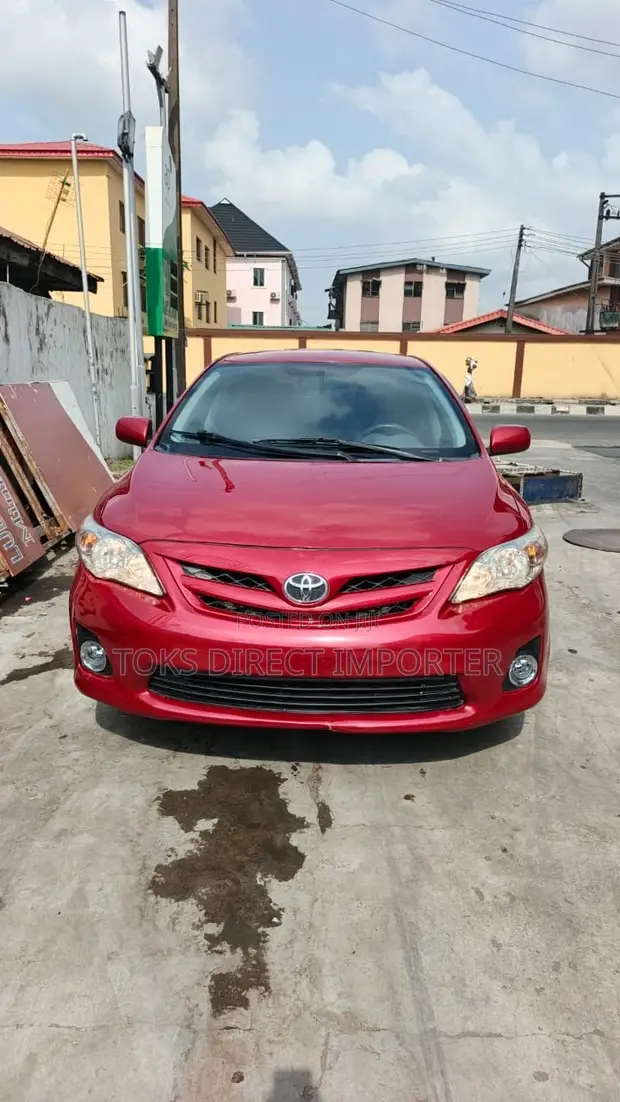 2011 Toyota Corolla LE Sedan - Red - 1