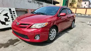 2011 Toyota Corolla LE Sedan - Red