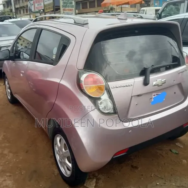 Chevrolet Spark 2012 Pink - 1