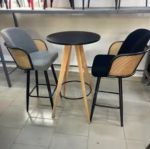 Modern Pub Set: Round Black Table & 2 Woven Rattan Stools