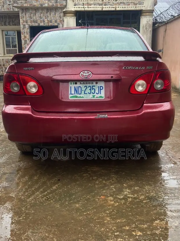 2006 Toyota Corolla LE Red - 1