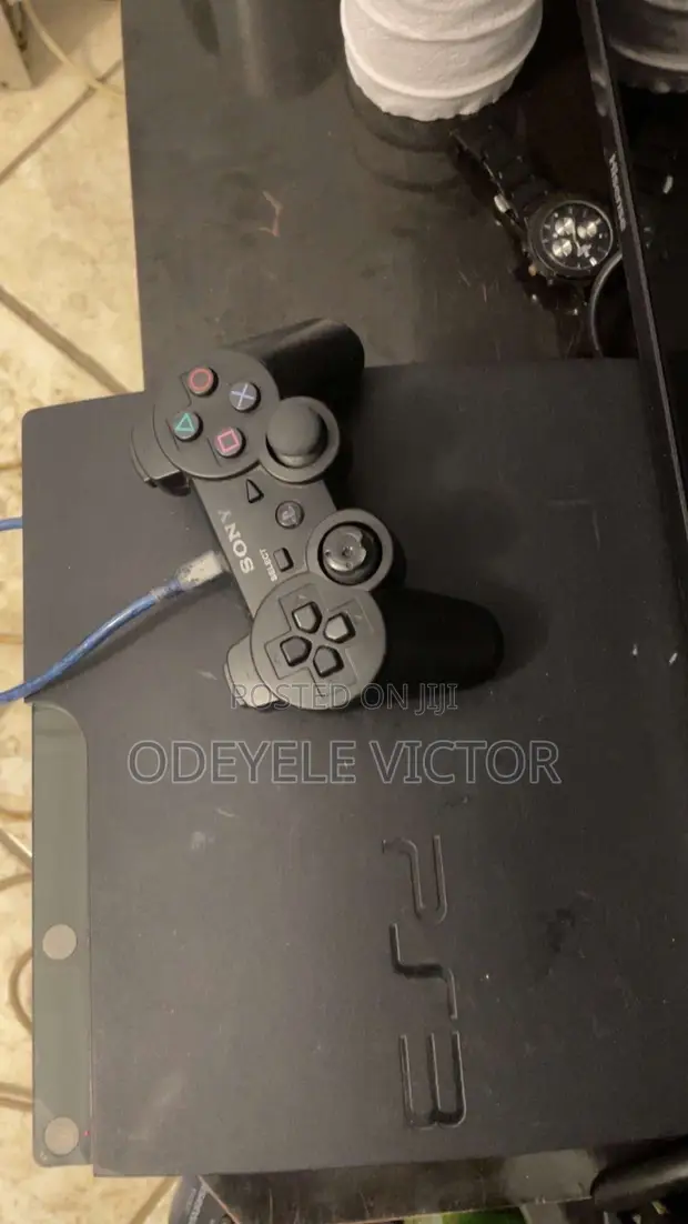 PlayStation 3 Slim Console with 7 Games - 1