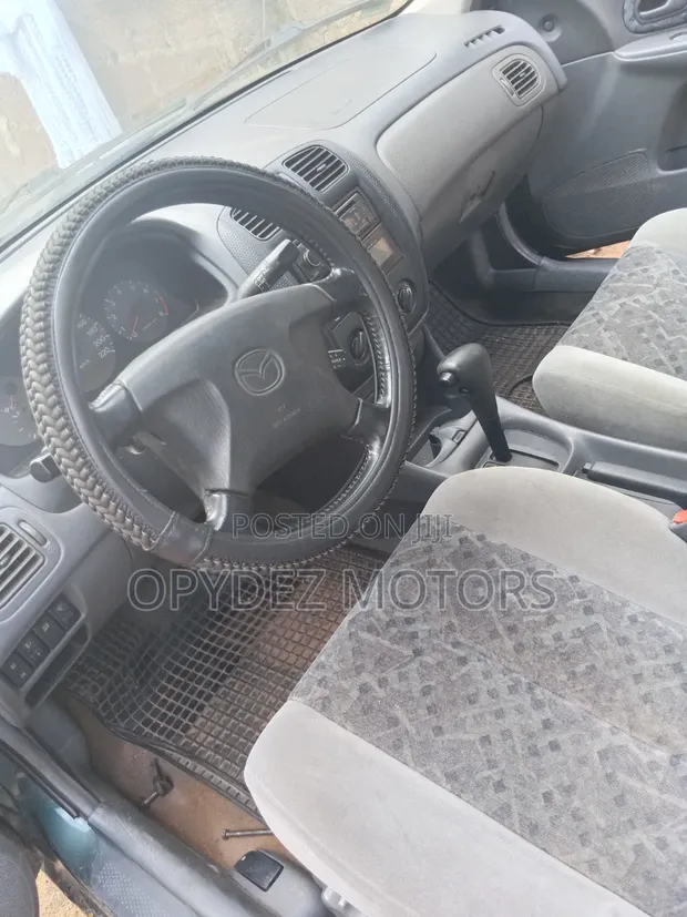 Mazda 323 2004 Kore - 1