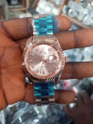 Rolex Watch - Gold Band
