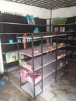 Neatly Used Supermarket Shelves and Canters - 1