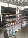 Neatly Used Supermarket Shelves and Canters - 2