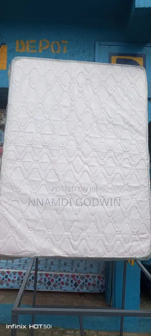 Brand New Foam Mattress and Bed Frame (75x54x8 inches)
