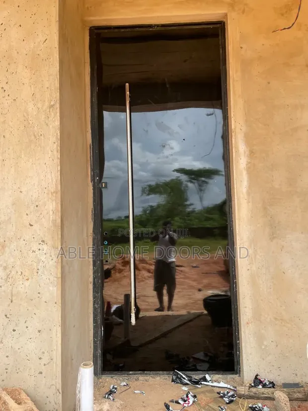 Able Home Doors 4ft x 10ft Ƙofar Tsaro Mai Juyawa - 1