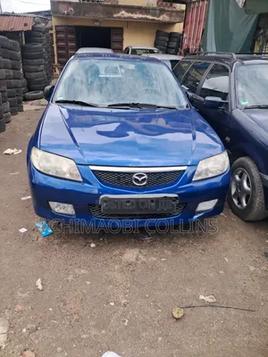 Mazda 323 2004 Blue