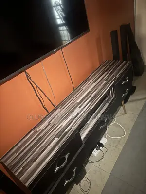 Used Brown Wooden TV Stand