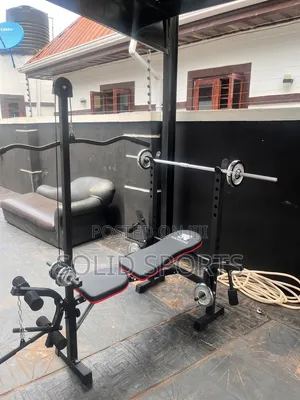 Brand New Adjustable Bench with 50kg Weight Set