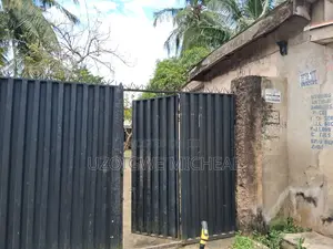 Plot of Land with Mixed-Use Structures for Sale, Ijanikin