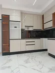Modern Kitchen Cabinets by Home Interiors - 1