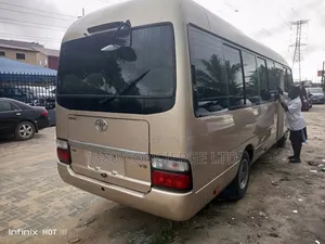 Toyota Coaster 2012 Zinariya Mai Zama 29