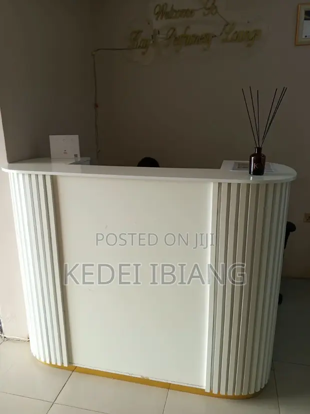 Used Off-White Reception Table with Storage - 1