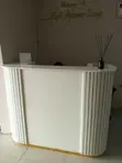 Used Off-White Reception Table with Storage - 1