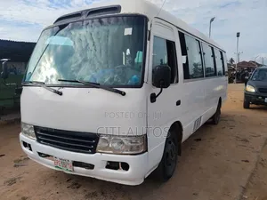Toyota Coaster 2010 White Bus