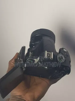 Nikon D5100 DSLR Camera with 50mm Prime Lens