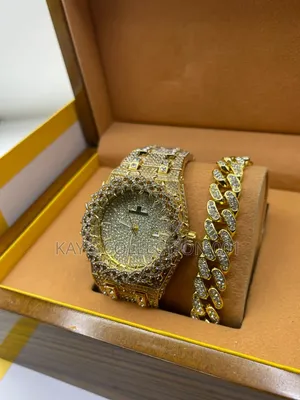 Cartier Wrist Watch - Gold/Silver Band, Red Case