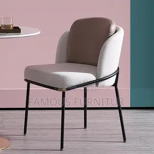 Modern Upholstered Dining Chair with Curved Barrel Back