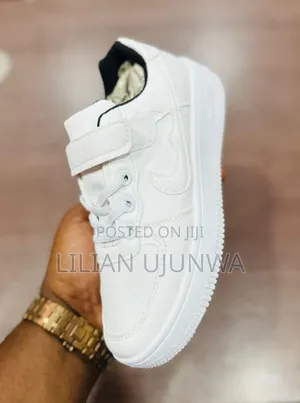 Nike White Kiddies Sneakers - Sizes 34, 36