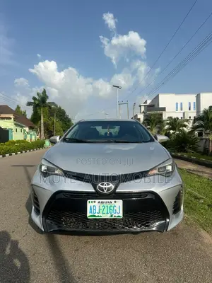 Toyota Corolla LE Sedan 2015 - Launin Azurfa