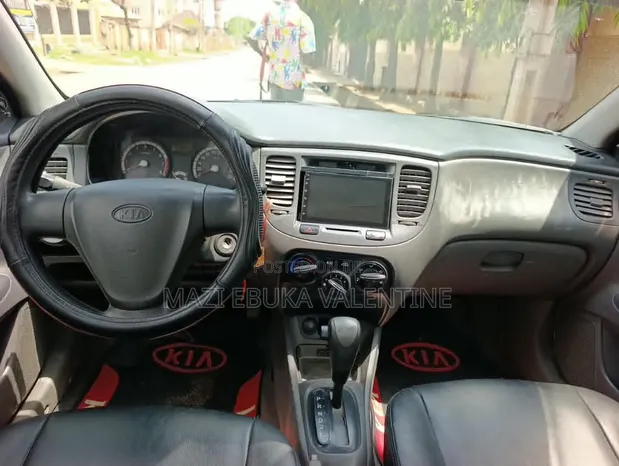 2010 Kia Rio Black - 1