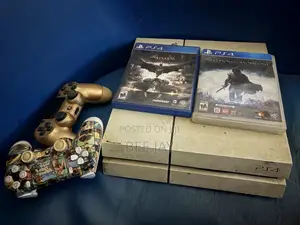 PS4 Fat Console with 2 Controllers & Games