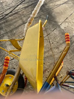 Brand New Steel Wheelbarrow - Yellow